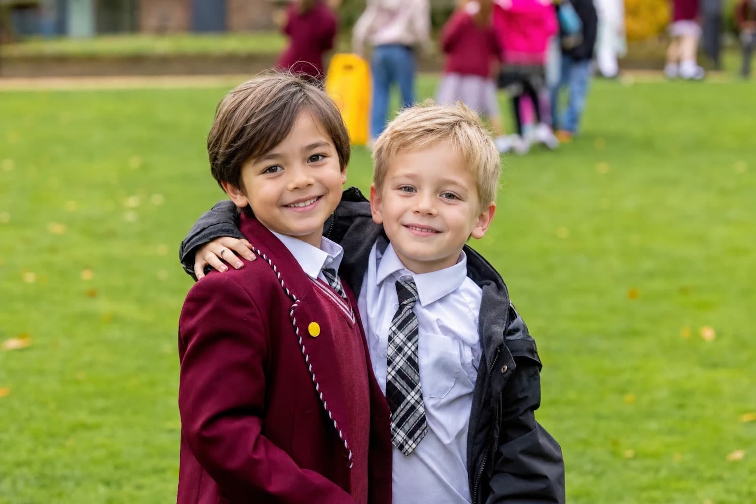 Public-facing version of the same school-grounds photo with the setting preserved and the pupils anonymised.